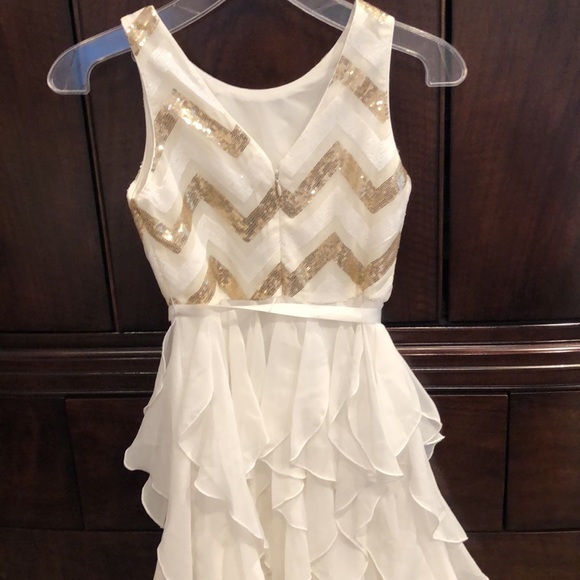 Beautiful ivory and gold sequined dress. Ruffle layers. Worn 2 x’s - Picture 4 of 5